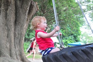 caroline on a tire swing